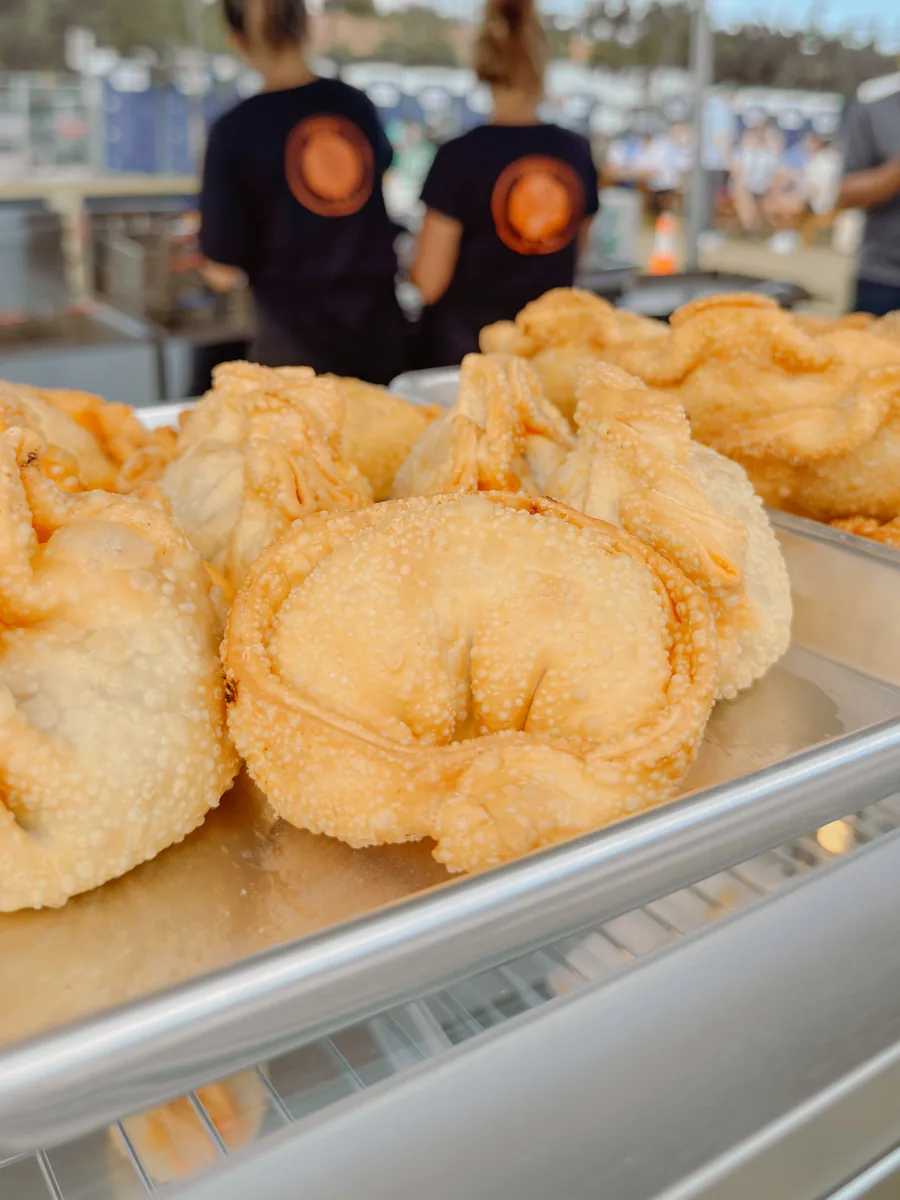 Fresh empanadas ready to serve at a catering event